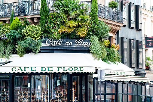Café de Flore in Saint Germain des Près, closed during second wave and second lockdown Covid-19 in France. The beautiful Cafe De Flore is one of the oldest cafe in Paris, located in 6th arrondissement, in Saint Germain des Près. It was associated with Jean Paul Sartre, Simone de Beauvoir, Albert Camus, Pablo Picasso... Paris, in France, boulevard Saint Germain. November 9, 2020