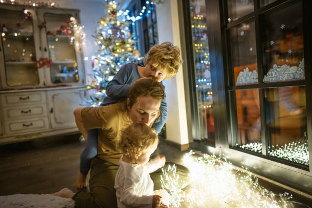 istock Mother celebrate Christmas with her Boys 1286231814