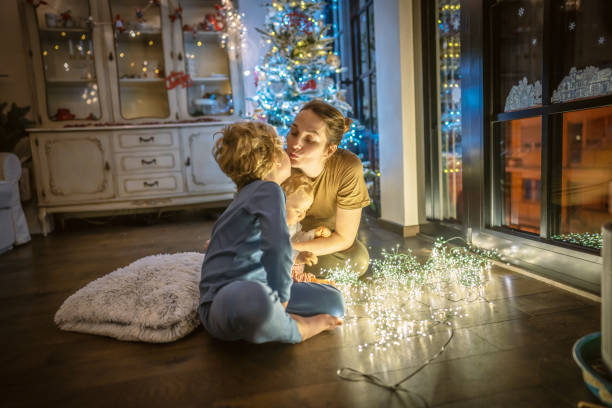 istock Mother celebrate Christmas with her Boys 1286231943