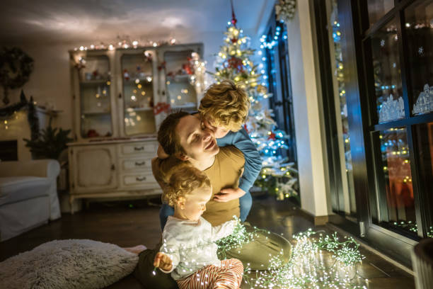 istock Mother celebrate Christmas with her Boys 1286232484