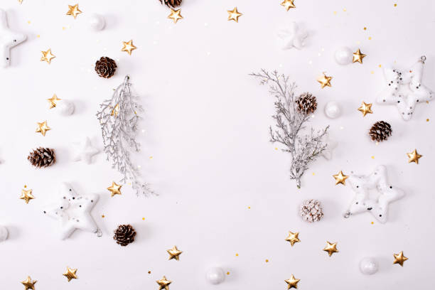 istock Top view of blank notebook on white wooden background with xmas decorations, copy space. Christmas background with notebook for wish list or to do list, red gift boxes, fir tree branches. Flat lay 1286235894