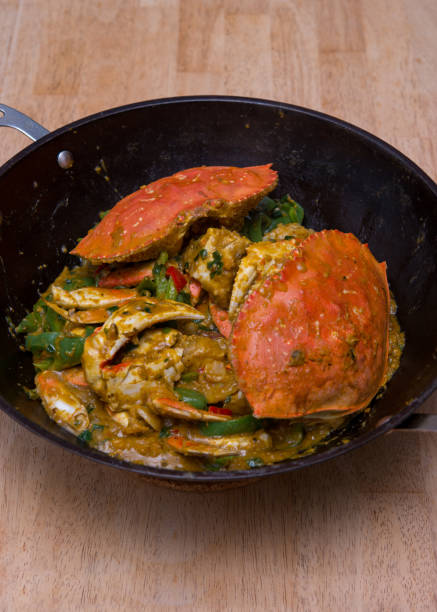 istock Stir fried Dungeness Crabs with spiced sauce in cast iron wok 1286236903