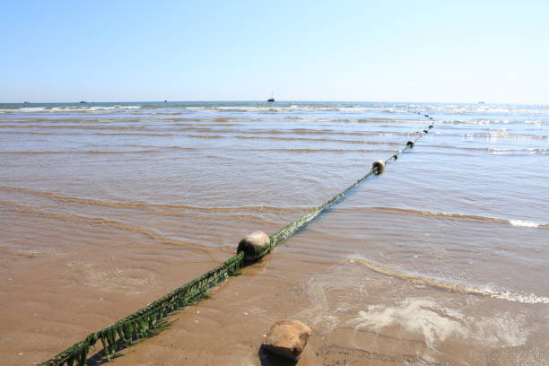 istock Seaside scenery, fishing nets in the sea 1286237945