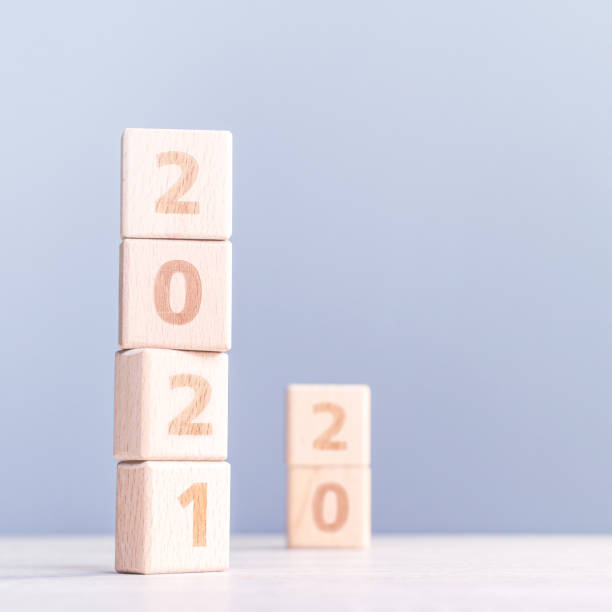 istock 2021 New year abstract design concept by wooden blocks with copy space. 1286238946