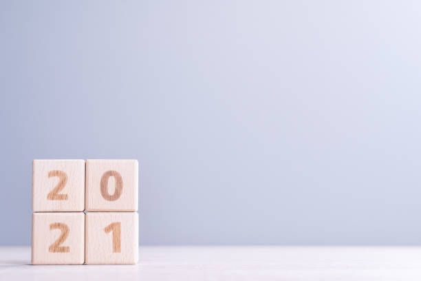 istock 2021 New year abstract design concept by wooden blocks with copy space. 1286239573