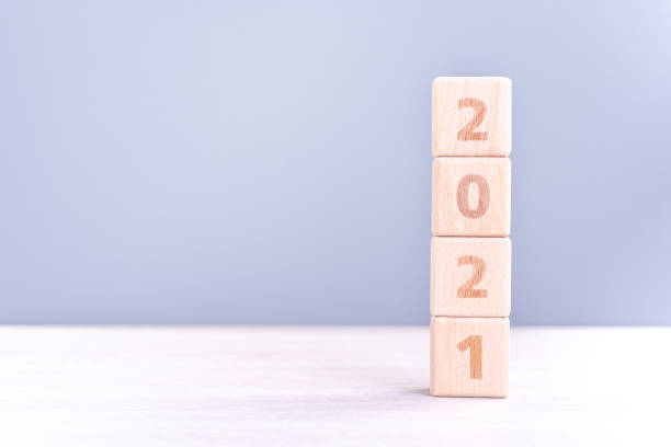 istock 2021 New year abstract design concept by wooden blocks with copy space. 1286239637