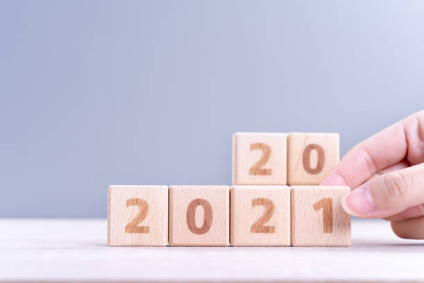 istock 2021 New year abstract design concept by wooden blocks with copy space. 1286239651