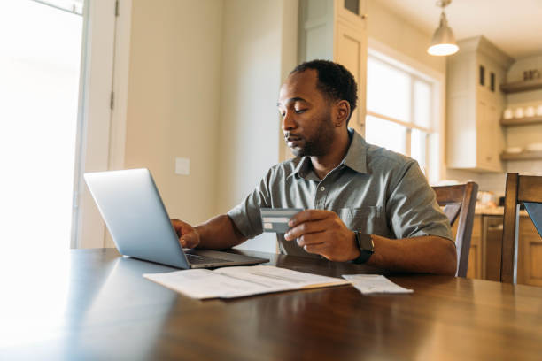 Man Paying Bills and Banking Online