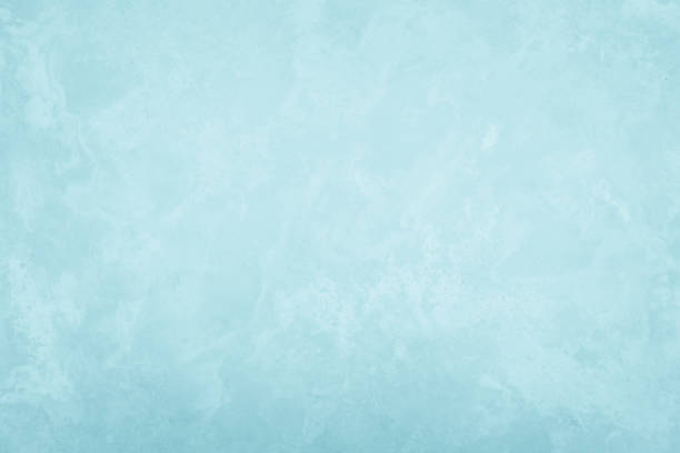 istock Pastel Blue and White concrete stone texture for background in summer wallpaper decor. Cement and sand wall of tone vintage. Concrete abstract light cyan color, cement texture mint green for design. 1286255475