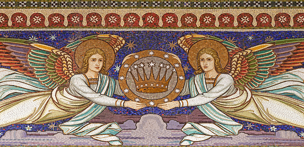 VIENNA, AUSTIRA - OCTOBER 22, 2020: The mosaic of angels with the crown in church Pfarrkirche Kaisermühlen.