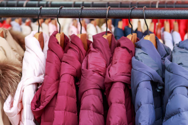 istock Winter multicolored jackets on hanger in the store close-up 1286261362