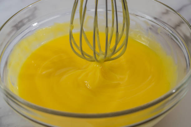 istock Lemon pudding or lemon curd in a glass bowl close up 1286262353