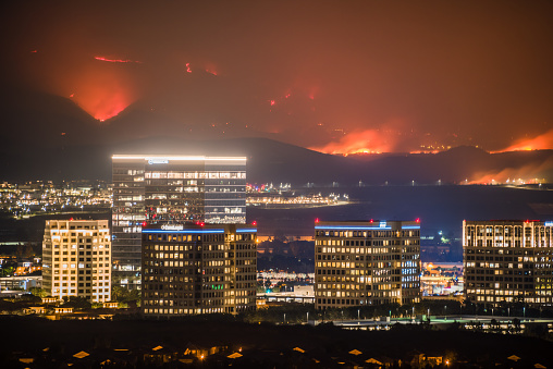 Two fires began early morning of October 26, 2020 which quickly spread over 30,000 acres in 48 hours. Over 90,000 people were mandated to evacuate. The size of the wildfires in the background can be seen compared to the city towers in the foreground.