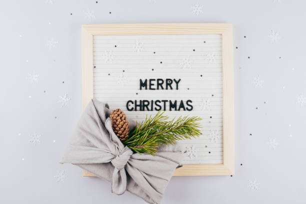 istock Christmas eco-friendly gift box furoshiki. Lightbox with text Merry Christmas. Zero waste concept 1286266197