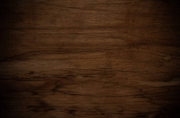 istock Dark brown wooden surface 1286267043