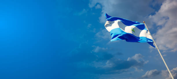 istock Nicaragua national flag with blank text space on wide background. 1286267311