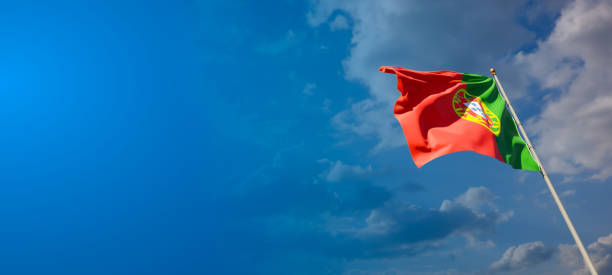 istock Portugal national flag with blank text space on wide background. 1286267875