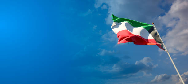 istock Kuwait national flag with blank text space on wide background. 1286268130