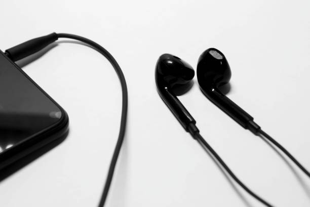 istock Earphone plugged in smartphone 1286268446
