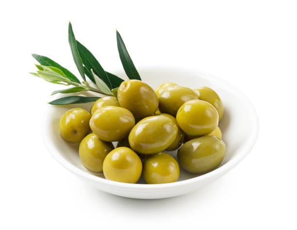 istock Salted olives and olive branches placed on a white background 1286269501