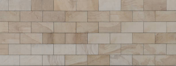 istock texture of a tiled beige stone wall with natural pattern as background 1286270459