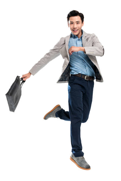 istock Happy bouncing youth business man 1286271438