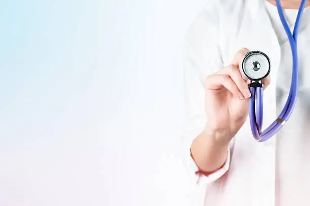 Photo of stethoscope in the doctor's hand