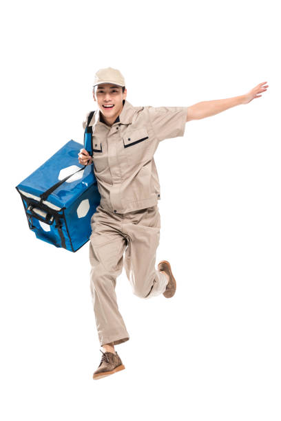 istock Young delivery Courier running room 1286274120