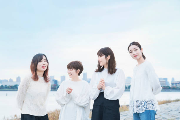 istock 4 Japanese women talking with a smile 1286274223