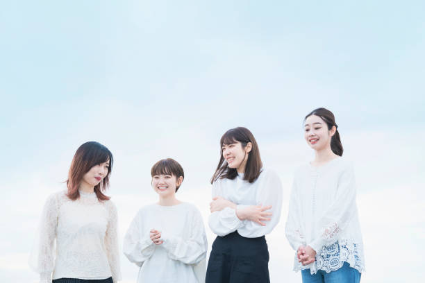 istock 4 Japanese women talking with a smile 1286274258