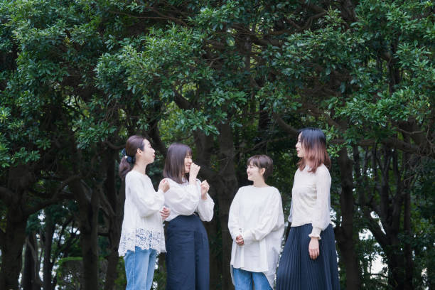 istock 4 Japanese women chatting in the park 1286275421