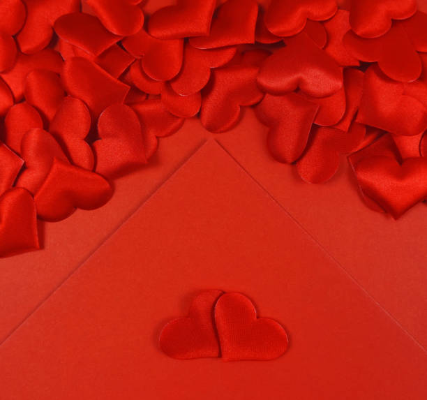 istock Valentines day concept. Romantic backgound, red hearts on red background, copy space 1286276521
