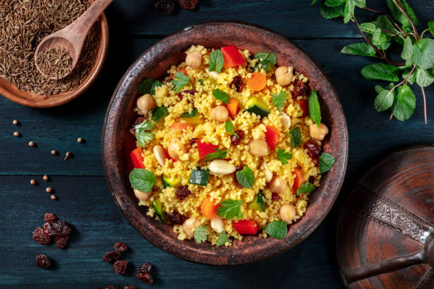 istock Couscous, overhead flat lay shot in a tagine with ingredients 1286277465