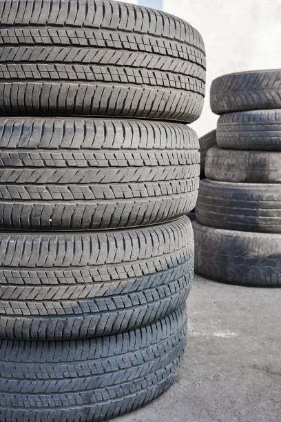 istock Stack of used car tires after wheel replacement 1286279616