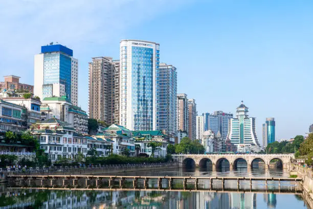 Modern tall buildings and bridge, Guiyang city landscape, China.