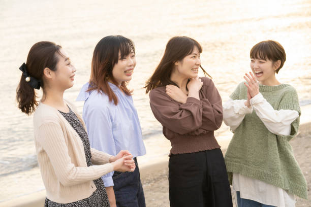 istock Four women talking happily in the dusk 1286279669