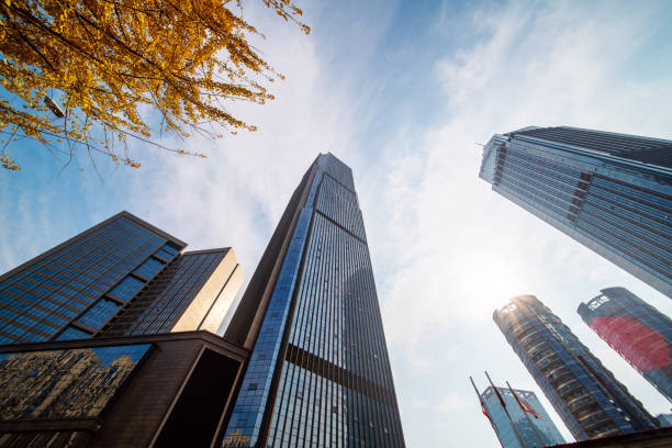 istock Modern Corporate Buildings in City Downtown District with Sun Light 1286279732