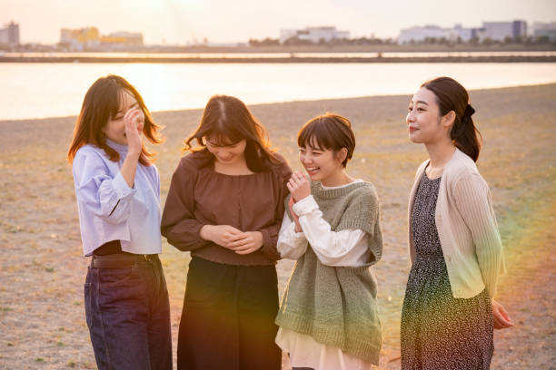 istock Four women talking happily in the dusk 1286279734