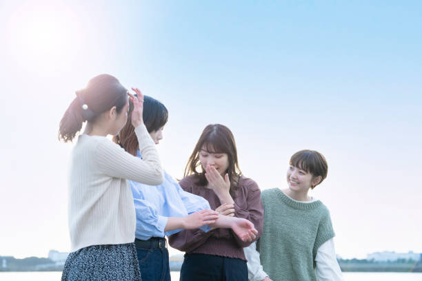 istock Four women talking happily in the dusk 1286279822