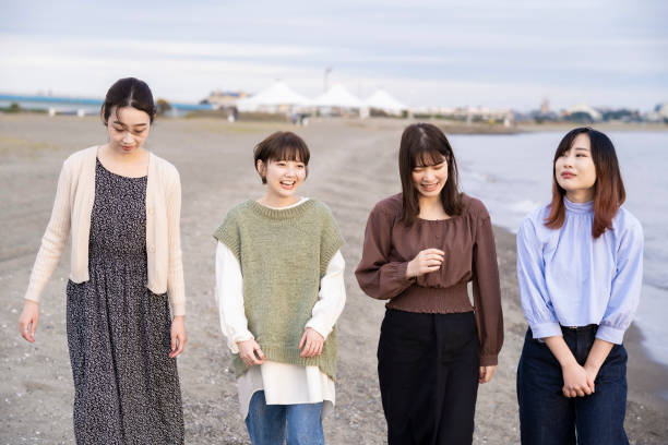 istock Four women talking happily in the dusk 1286279889