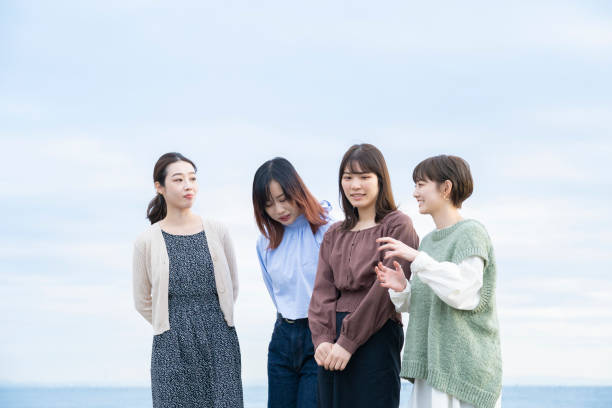 istock Four women talking happily in the dusk 1286279921