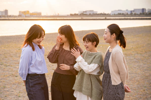 istock Four women talking happily in the dusk 1286280181
