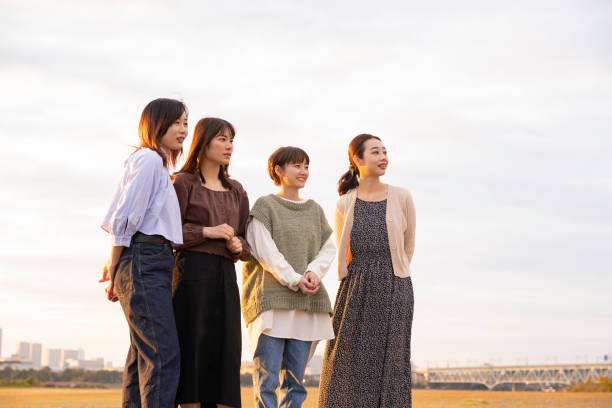 istock 4 women looking at the distant scenery 1286281055