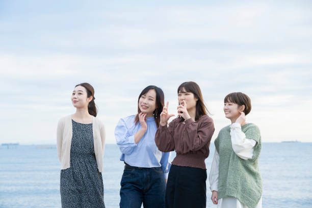istock 4 women looking at the distant scenery 1286281093