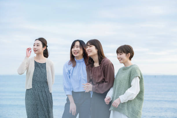 istock 4 women looking at the distant scenery 1286281230