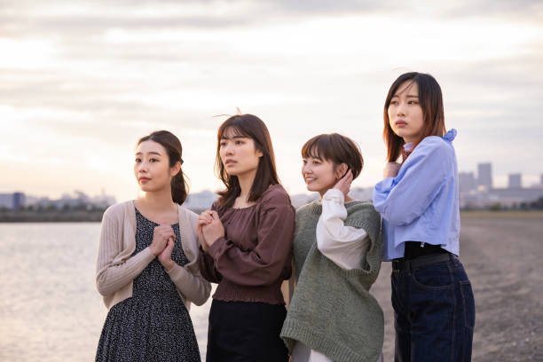 istock 4 women looking at the distant scenery 1286281464