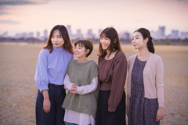 istock 4 women looking at the distant scenery 1286281614