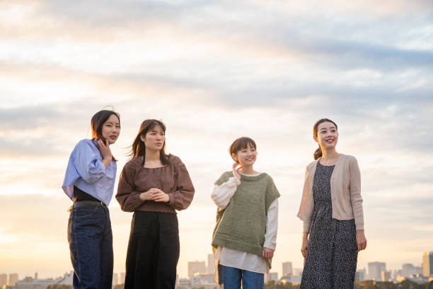 istock 4 women looking at the distant scenery 1286281747