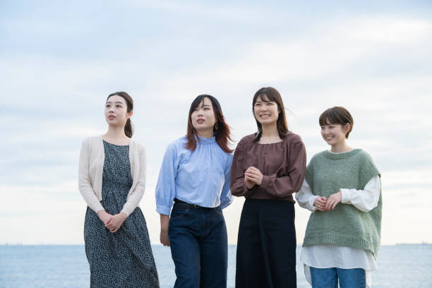 istock 4 women looking at the distant scenery 1286281919