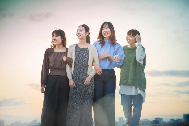 istock 4 women looking at the distant scenery 1286281945